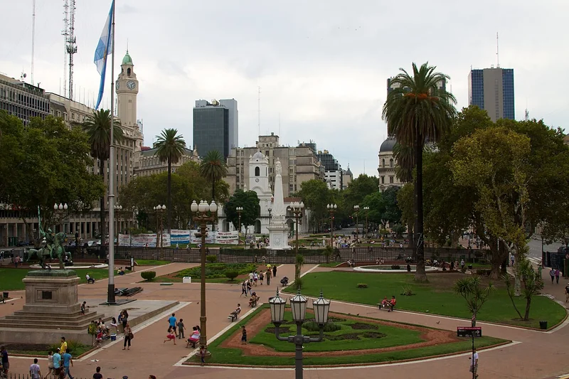 Paths, lawns and the central monument in Plaza de Mayo, Buenos Aires